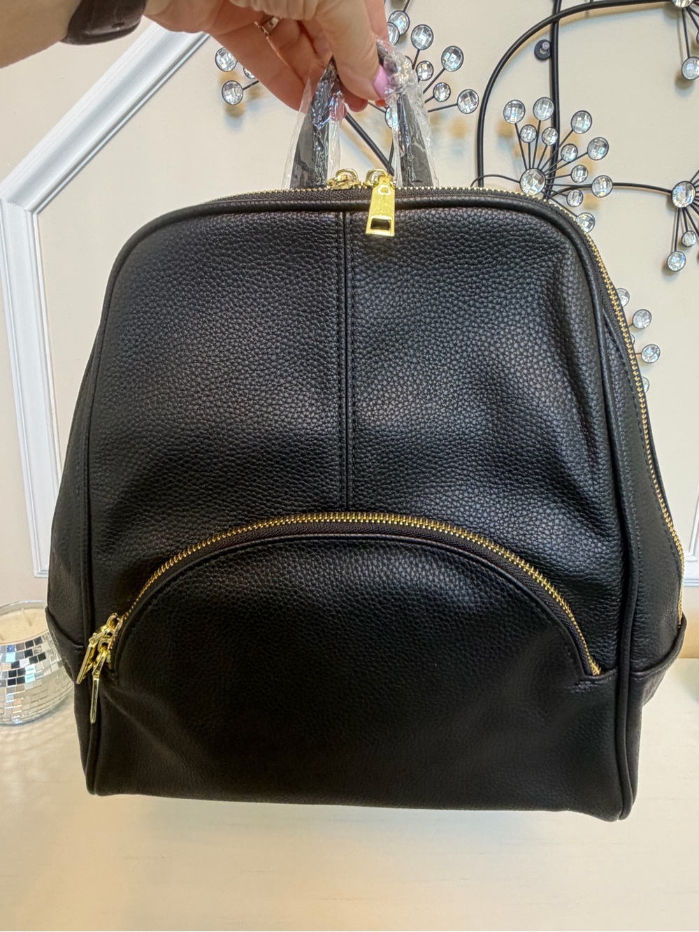 Structured Black Pebbled Backpack with Gold Zipper Accents